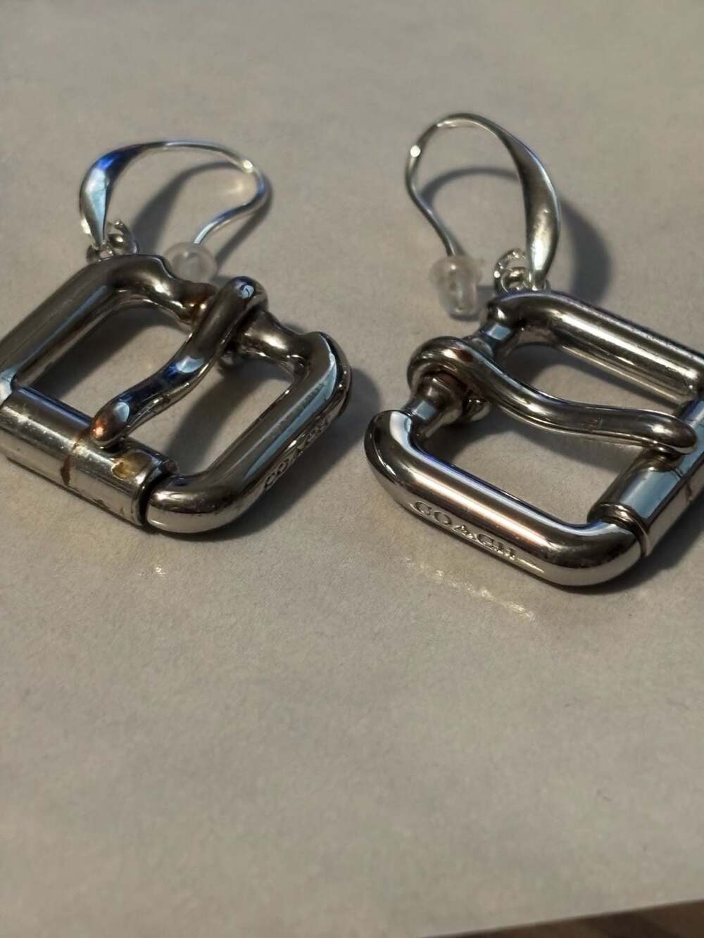Coach Silver Tone Belt Buckle Drop Earrings